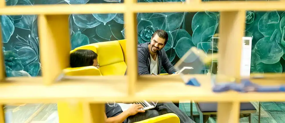 Fractional CMO consultant meeting with business owner to discuss marketing strategy and growth planning.